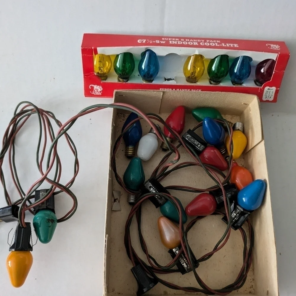 Vintage Christmas lights  Multicolor and extra bulbs.